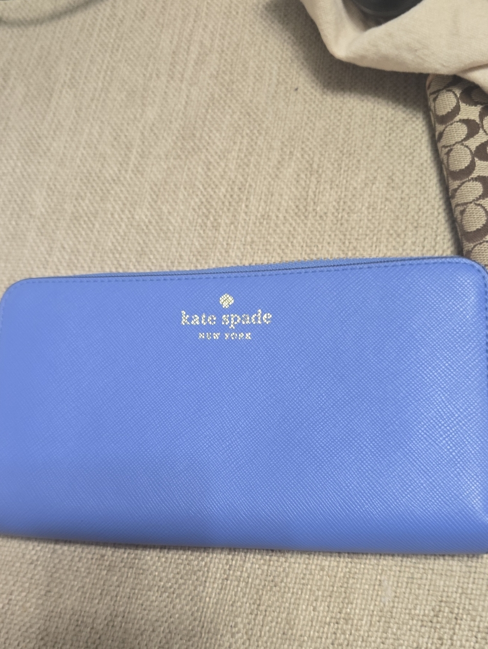 kate spade Periwinkle Zip-Around Wallet with Gold Logo